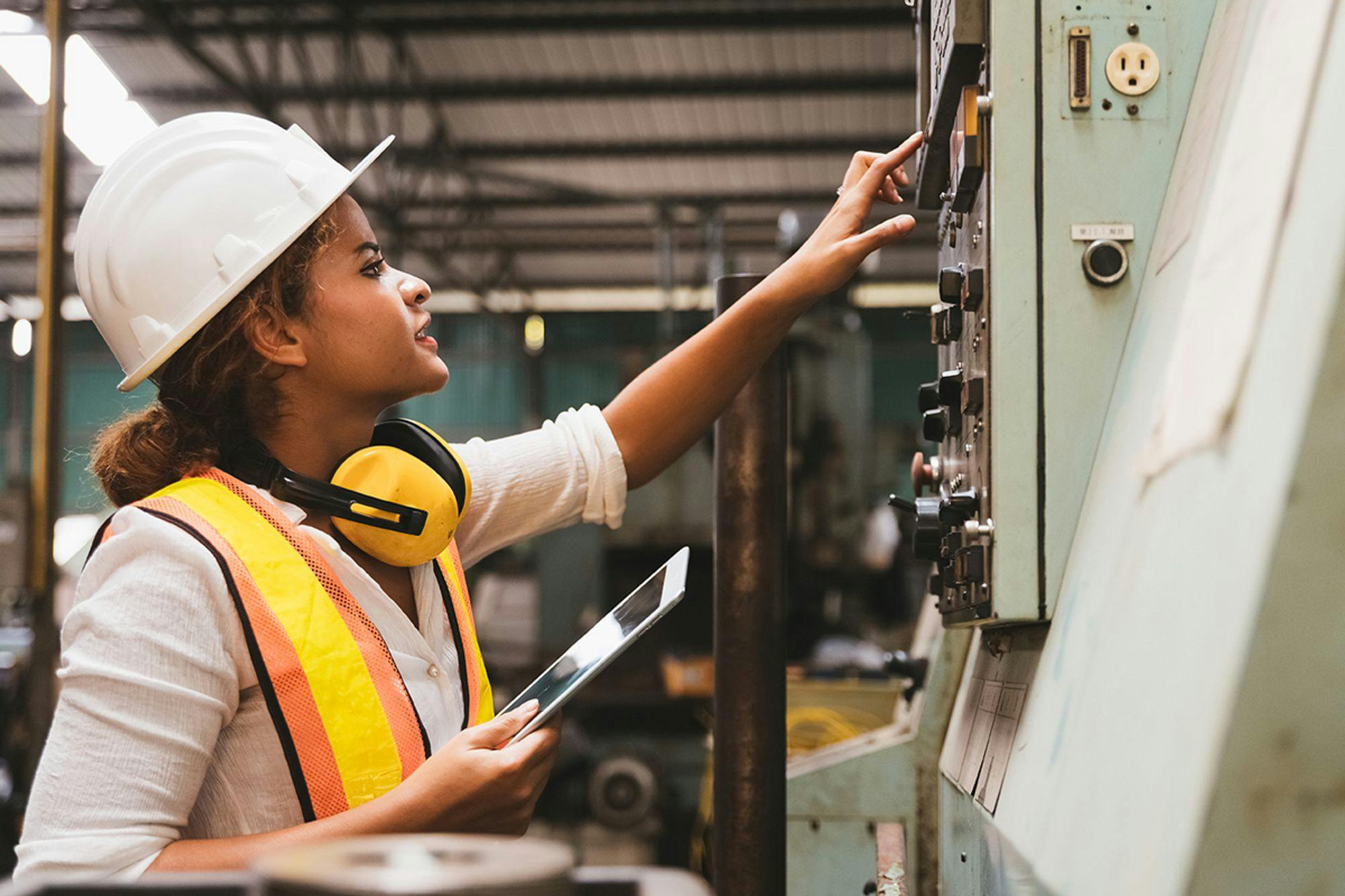 Industrial factory maintenance worker using TAG for cost-effective planning